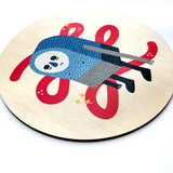 Sad James on a Wooden Circle